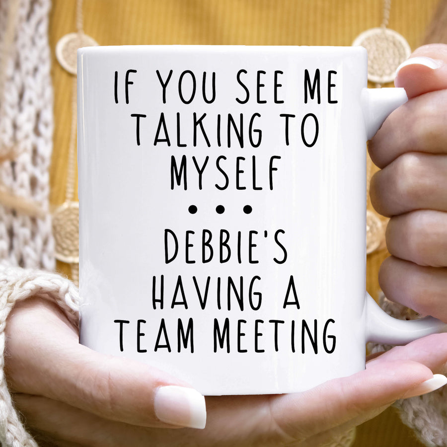 White ceramic mug with 'If You See Me Talking to Myself' quote.