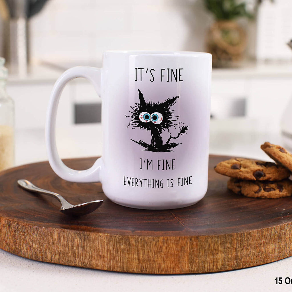 It’s Fine I’m Fine Everything’s Fine Coffee Mug – Choice of Sizes & Colors – 11oz or 15oz – White or Black-Handled