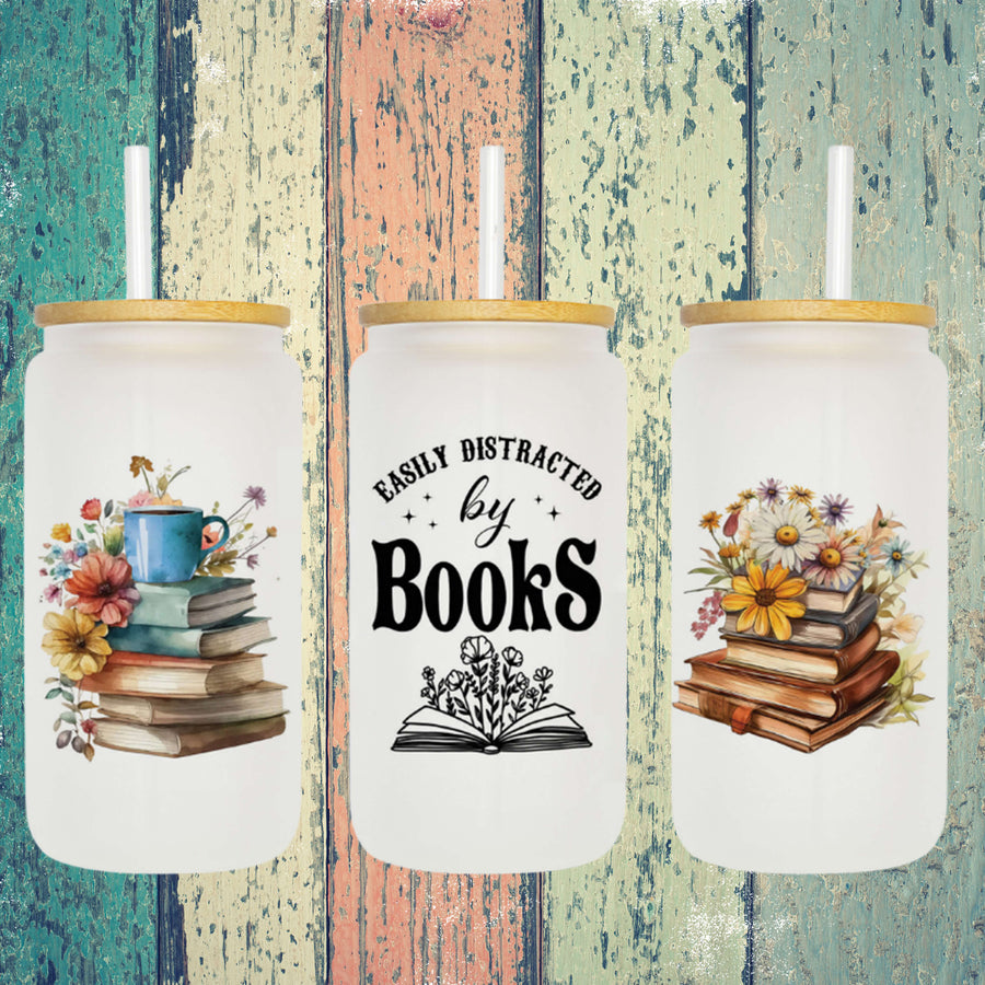 Front view of 'Easily Distracted by Books' frosted glass can tumbler.