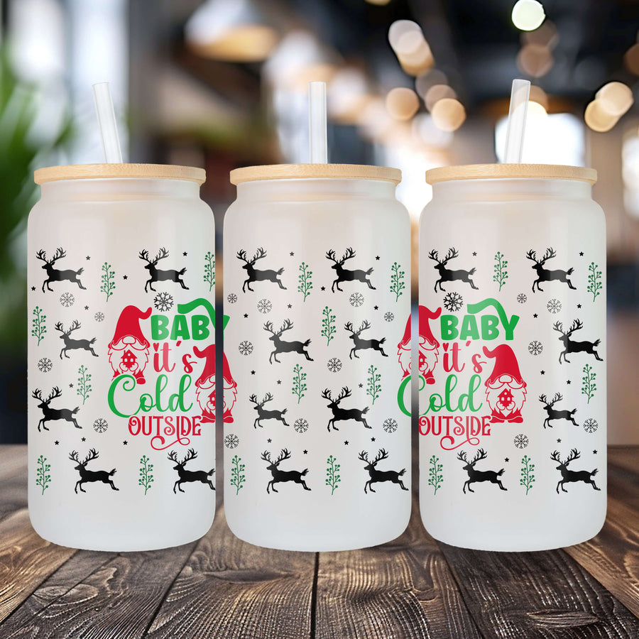 Frosted glass can tumbler with 'Baby It’s Cold Outside' holiday design and bamboo lid.