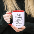 Red ceramic mug with best friends quote held in both hands.