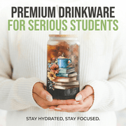 Lifestyle image of 'Easily Distracted by Books' frosted glass can tumbler on desk.