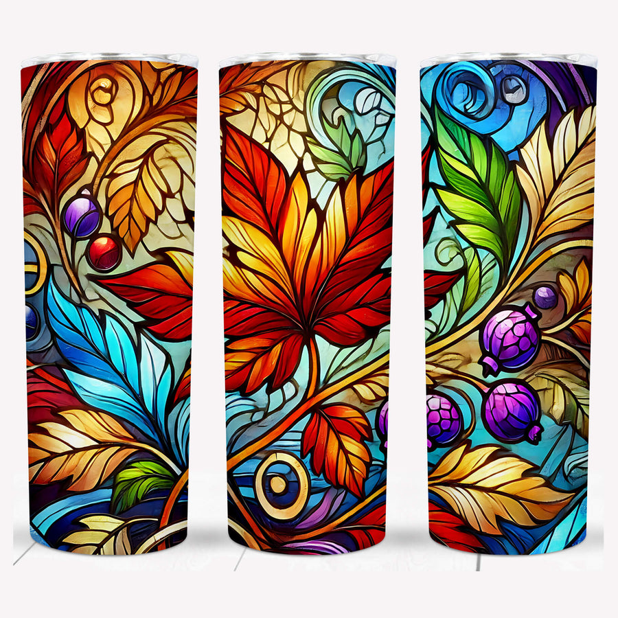 Autumn stained glass tumbler featuring vibrant fall leaves and berry designs in red, orange, and blue hues.