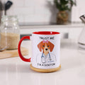 White ceramic mug with dog illustration and 'Trust Me I'm a Dogtor' text.