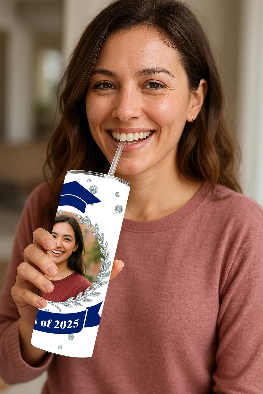 Custom photo graduation tumbler featuring a smiling woman holding the tumbler with a Class of 2025 design.