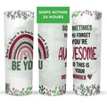 Be You, Be Awesome' 20 oz stainless steel tumbler with rainbow design and motivational text on a white background.
