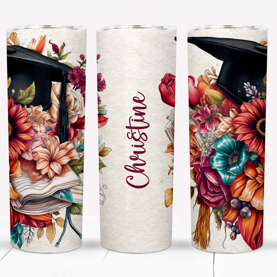 Personalized 20 oz BOHO floral graduation tumbler featuring a black cap, colorful flowers, and a name design.
