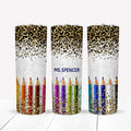 Personalized stainless steel tumbler with glitter, pencils, and the name "Ms. Spencer" in a stylish design.