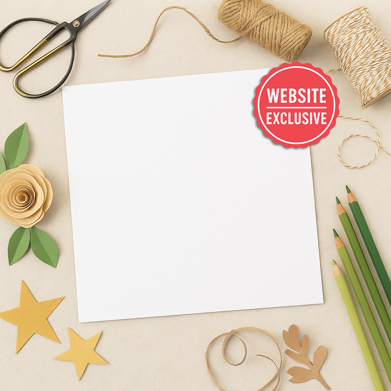 12” x 12” white cardstock sheet surrounded by crafting materials like scissors, twine, flowers, and colored pencils.