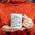 White ceramic mug with 'One Day at a Time' inspirational quote.