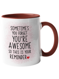 Burgundy coffee mug featuring the text "Sometimes you forget you're awesome so this is your reminder" in black font.
