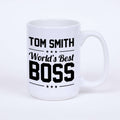 White ceramic coffee mug with 'World's Best Boss' custom name design.