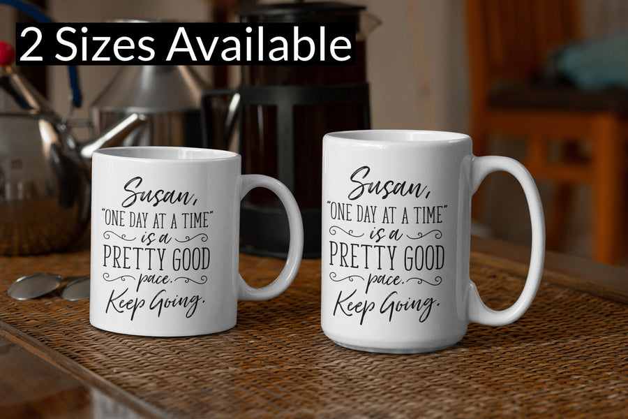 Front view of 'One Day at a Time' motivational mug.